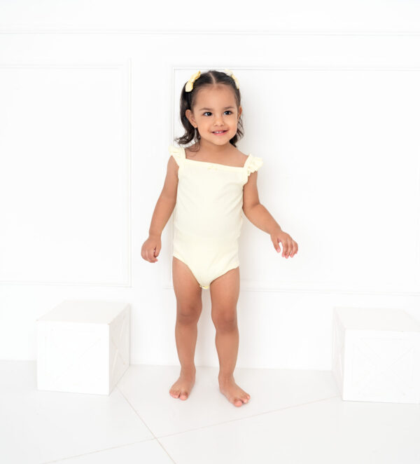 DSC_0019 Body de Tiritos con Volados Niña Amarillo Mantequilla